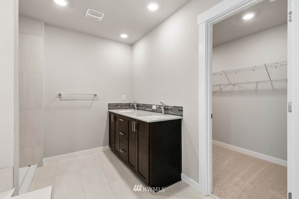 104 211th Street Southeast, Unit P18 Bothell, WA 98021 - Photo 22 of 31 a utility room with washer and dryer