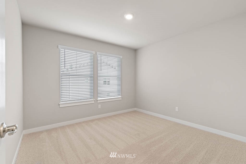 104 211th Street Southeast, Unit P18 Bothell, WA 98021 - Photo 26 of 31 an empty room with a window
