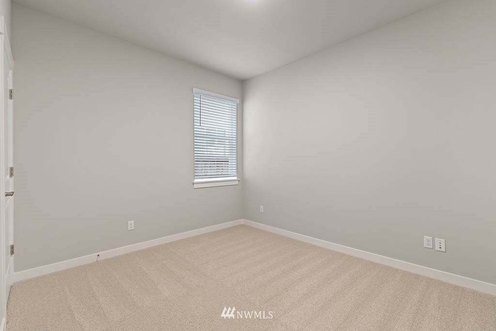 104 211th Street Southeast, Unit P18 Bothell, WA 98021 - Photo 28 of 31 an empty room with windows