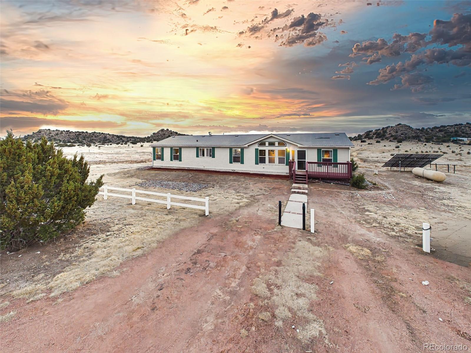 a view of a lake with a big yard