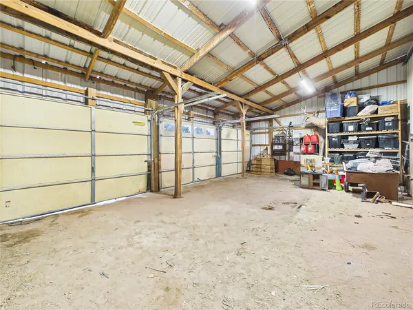 a view of a garage with storage