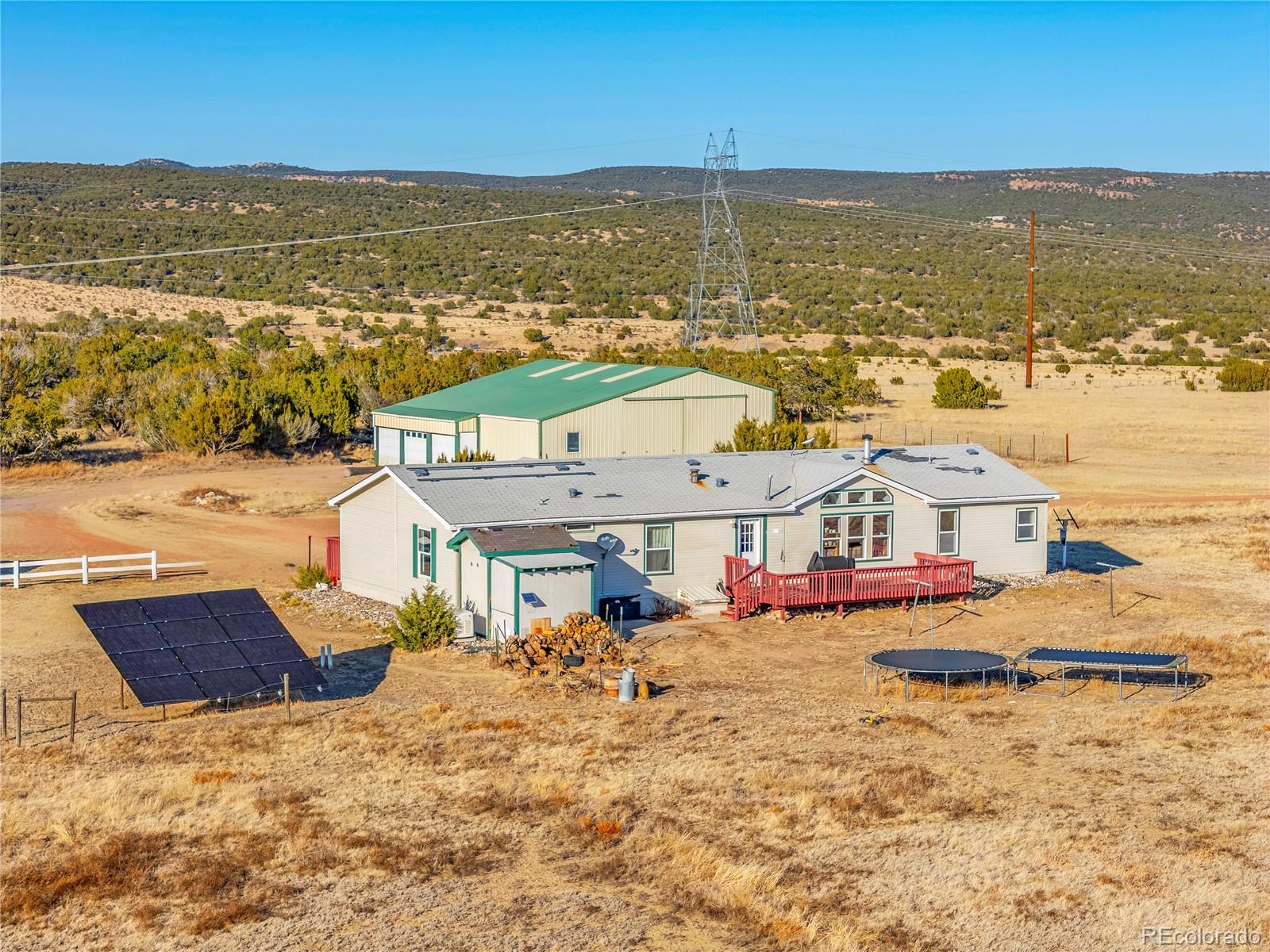 699 Cedar Hills Road Penrose, CO 81240 - Photo 45 of 50 a view of an ocean with a nearby beach