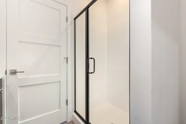 a view of a room with racks on the wall