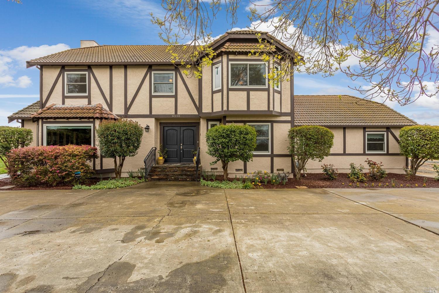 4520 Solano Road Fairfield, CA 94533 - Photo 1 of 1 a front view of a house with a garden