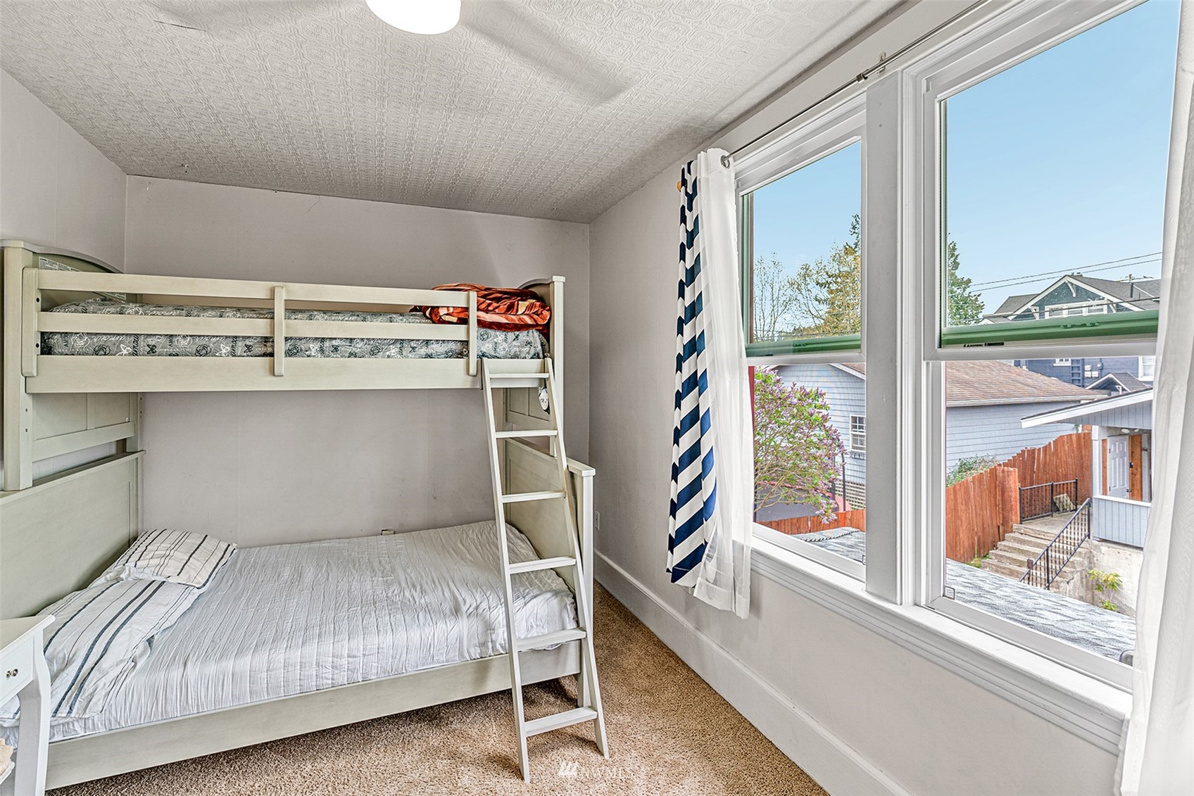 3626 Rockefeller Avenue Everett, WA 98201 - Photo 25 of 40 a bedroom with a bed and a window