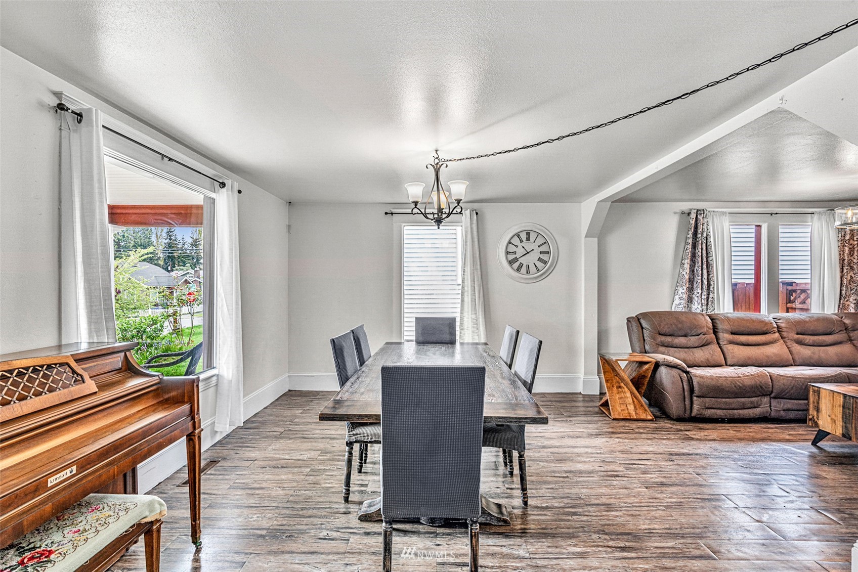 3626 Rockefeller Avenue Everett, WA 98201 - Photo 8 of 40 a view of a dining room with furniture window and wooden floor