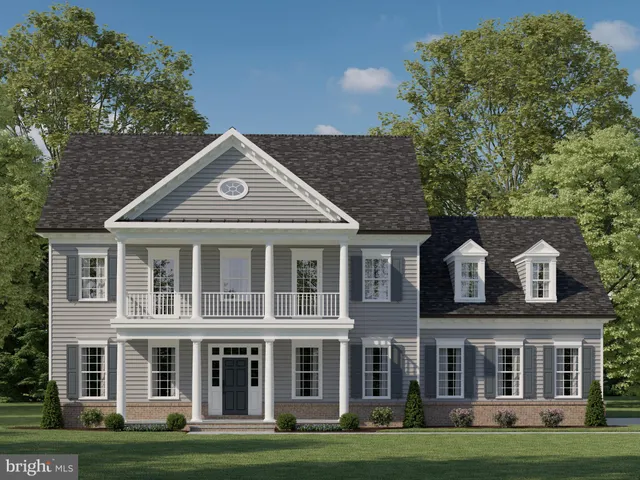 front view of a house with a garden