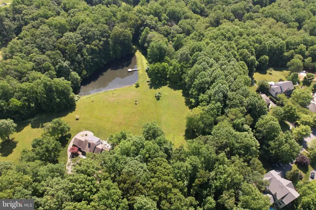 a view of a livingroom with furniture and a window