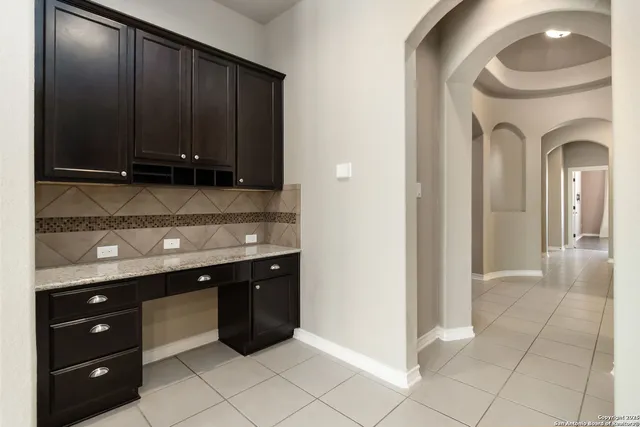 a room with a sink and a cabinets