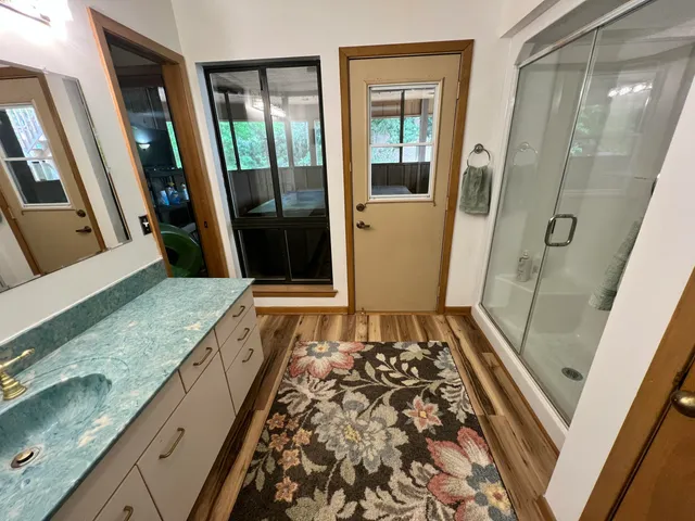 a bedroom with a bed and a television