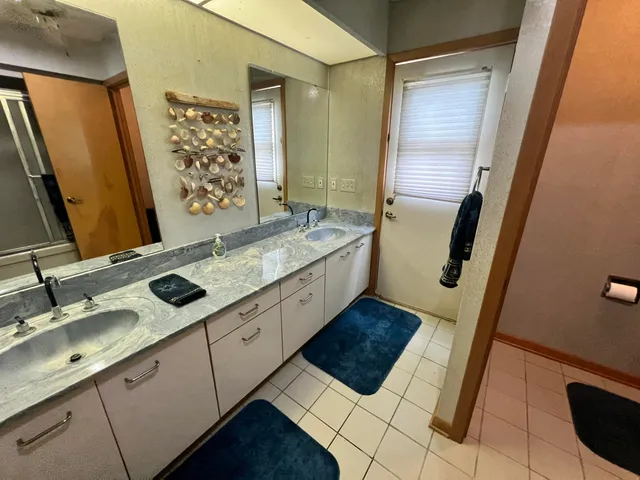 a view of balcony with furniture