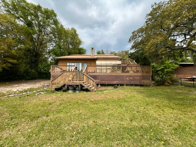 a view of a house with a swimming pool
