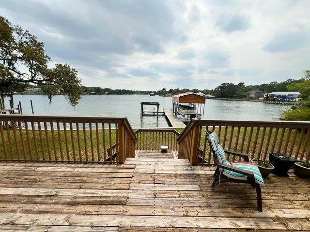 a view of balcony with wooden floor and outdoor space