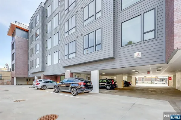 a view of a car park in front of building