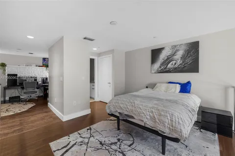 a view of an entryway with a floor to ceiling window