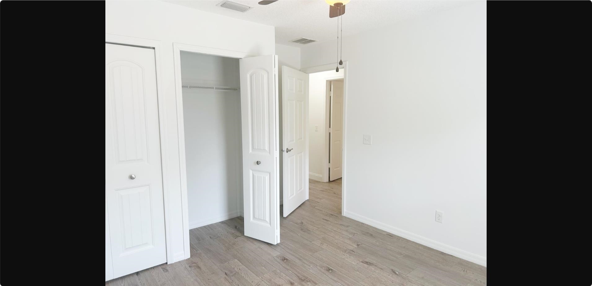 209 7th Street St. Augustine, FL 32080 - Photo 14 of 28 a view of hallway with wooden floor