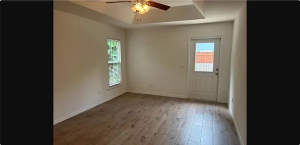 an empty room that has a window