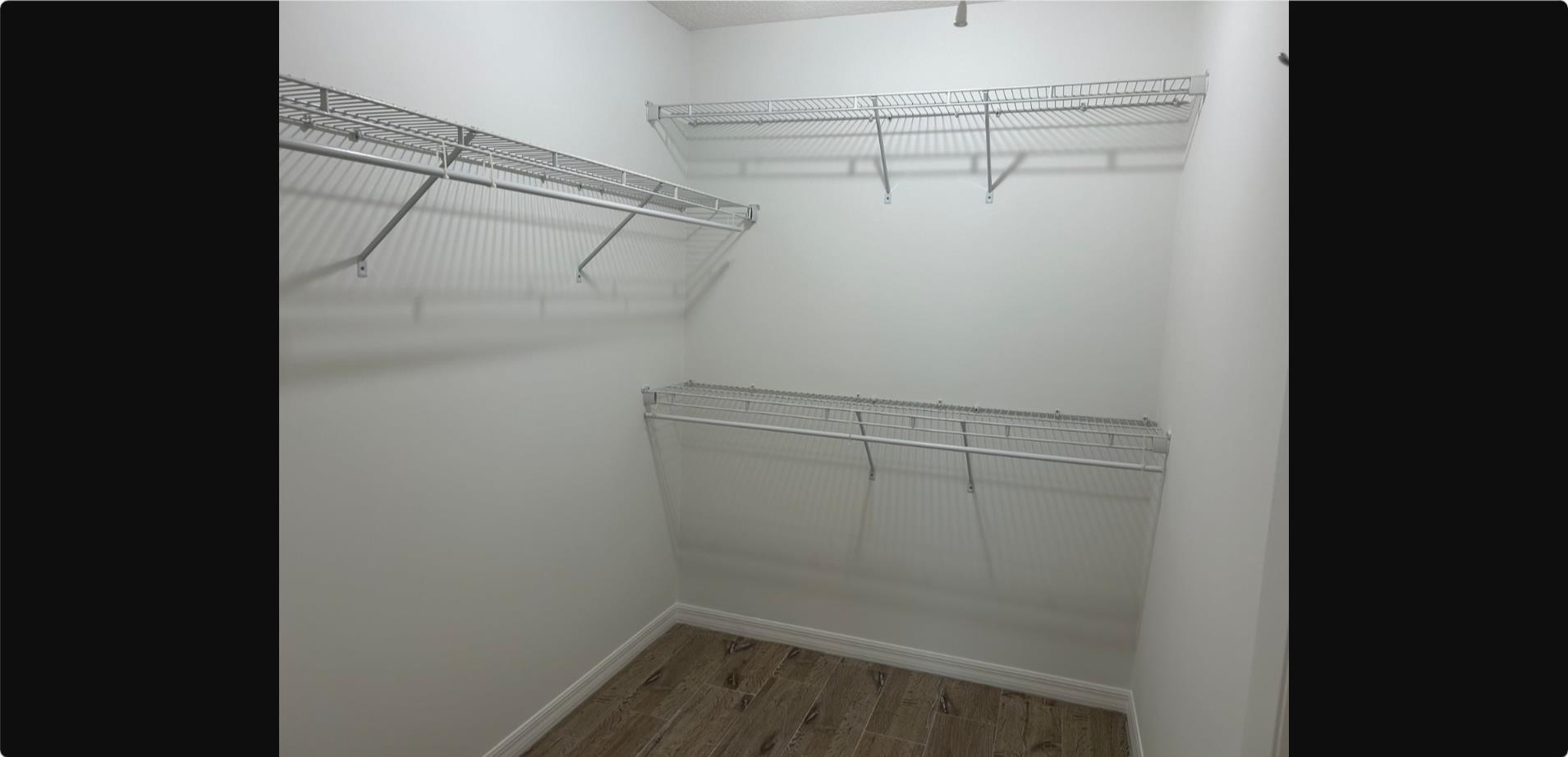 209 7th Street St. Augustine, FL 32080 - Photo 10 of 28 a view of a room with racks on the wall