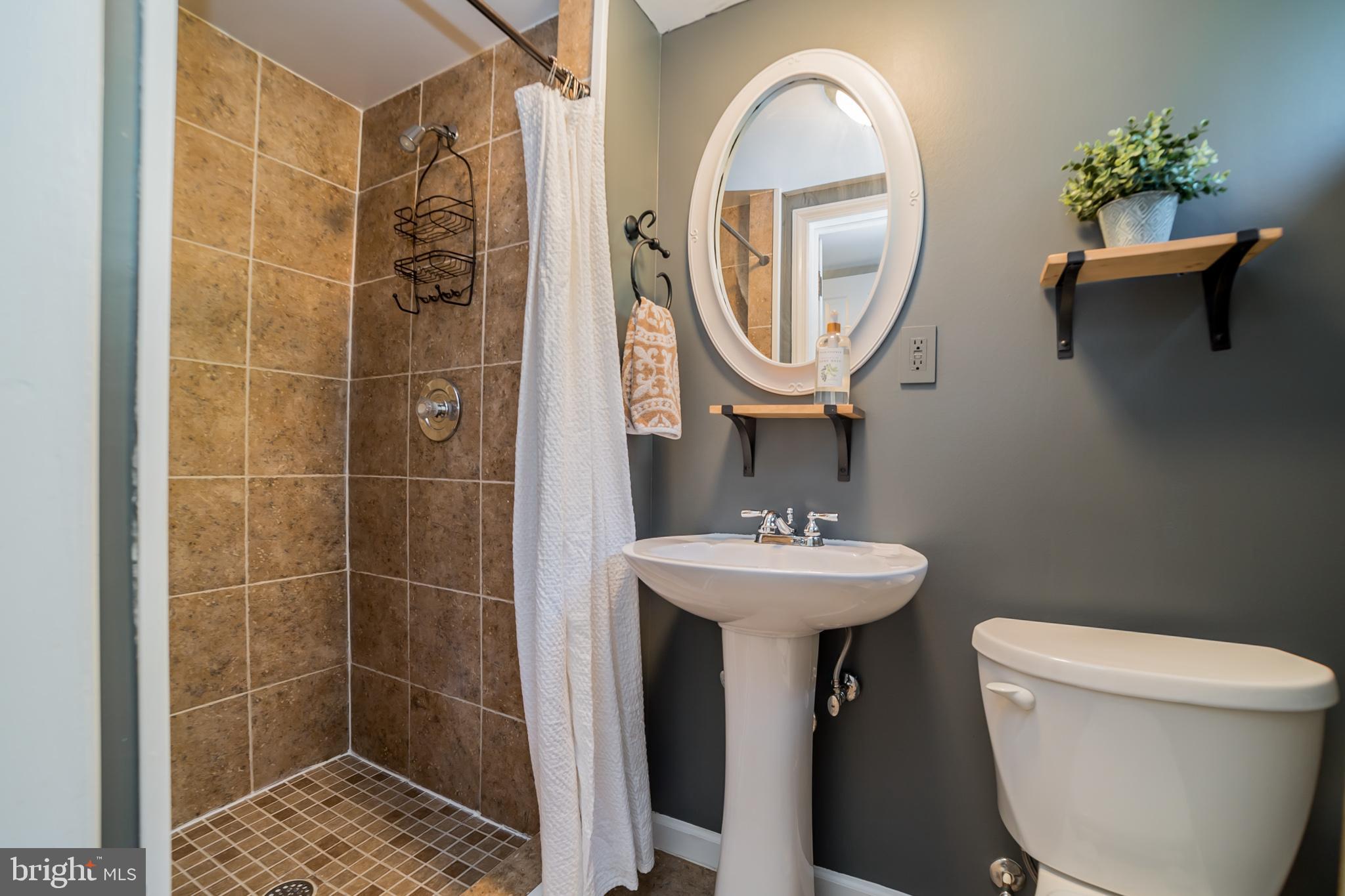 403 Lambeth Road Baltimore, MD 21228 - Photo 25 of 30 Lower level full updated bathroom