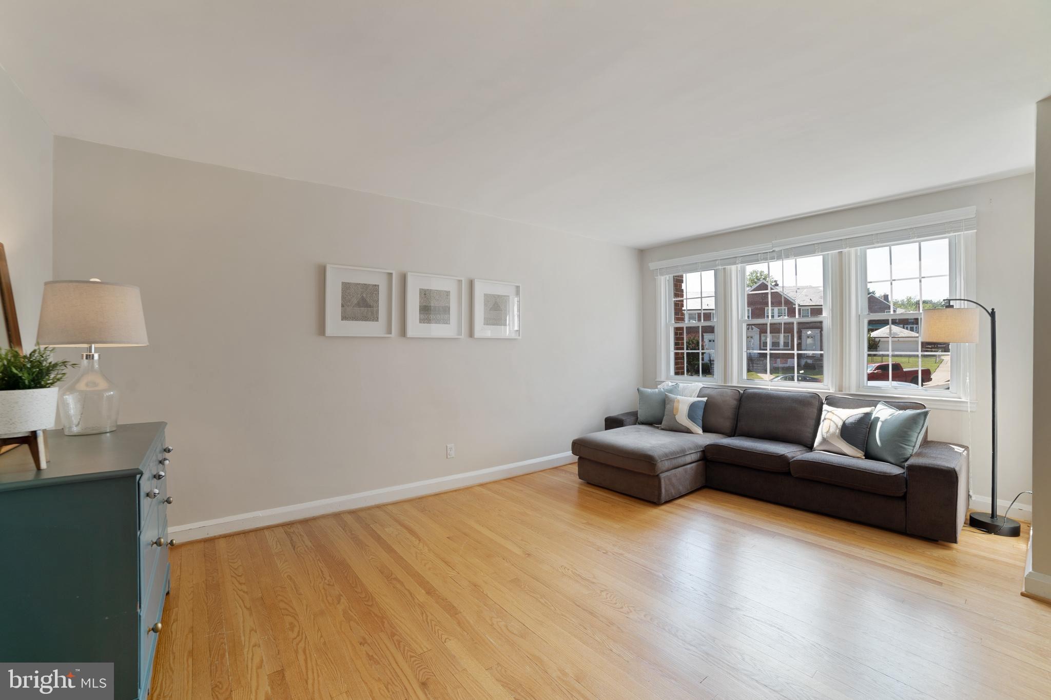 403 Lambeth Road Baltimore, MD 21228 - Photo 4 of 30 Living room with wooden floors