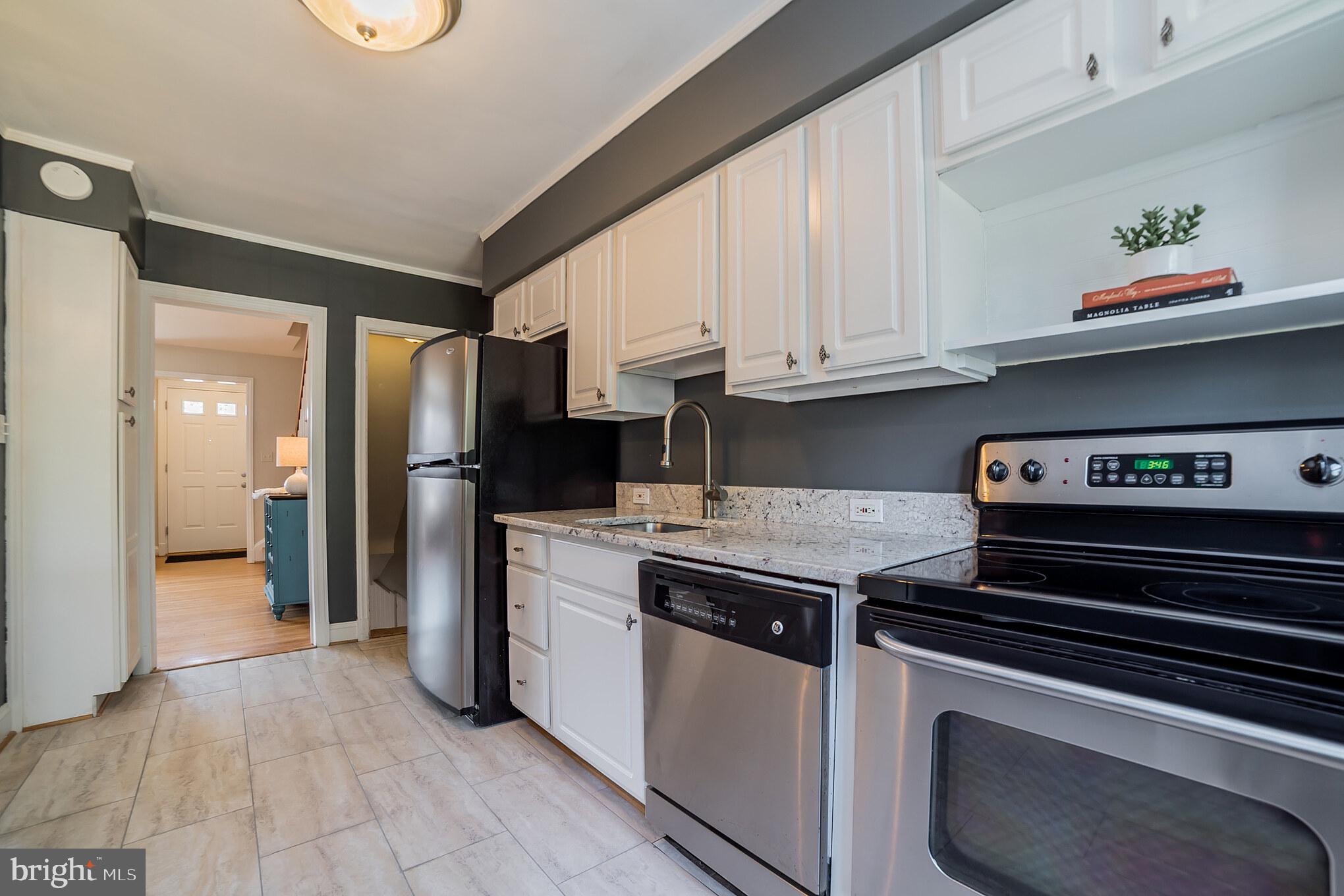 403 Lambeth Road Baltimore, MD 21228 - Photo 10 of 30 Kitchen with stainless steel appliances