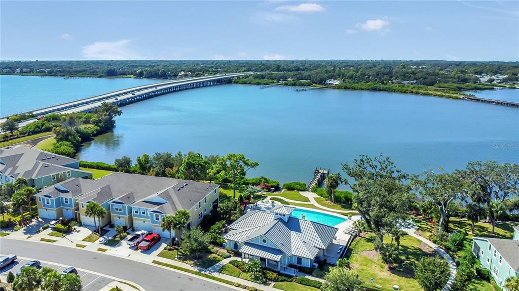 9009 Palm Key Avenue Oldsmar, FL 34677 - Photo 3 of 38 an aerial view of a houses with a lake view