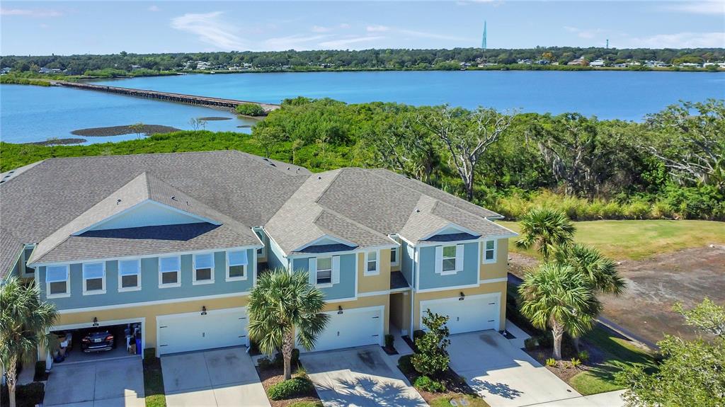 9009 Palm Key Avenue Oldsmar, FL 34677 - Photo 35 of 38 an aerial view of a house with a lake view