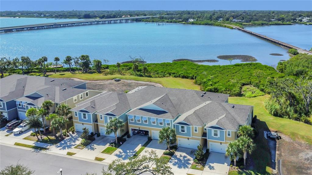 9009 Palm Key Avenue Oldsmar, FL 34677 - Photo 36 of 38 an aerial view of a house with a lake view