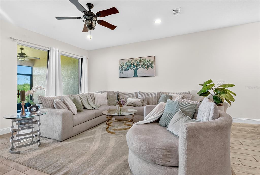 9009 Palm Key Avenue Oldsmar, FL 34677 - Photo 6 of 38 a living room with furniture