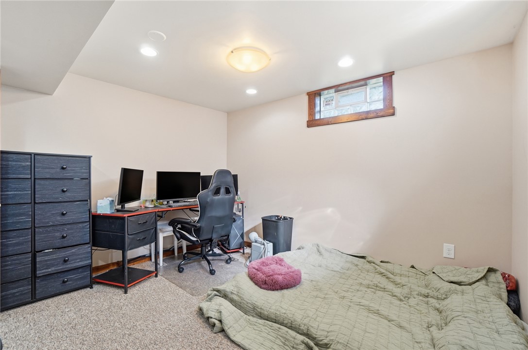 1325 Chelsea Road Troy, OH 45373 - Photo 33 of 42 This versatile basement space features recessed lighting, offering comfort and convenience.