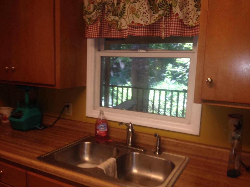 8877 Briery Branch Road Dayton, VA 22821 - Photo 5 of 12 a kitchen with a sink and a window