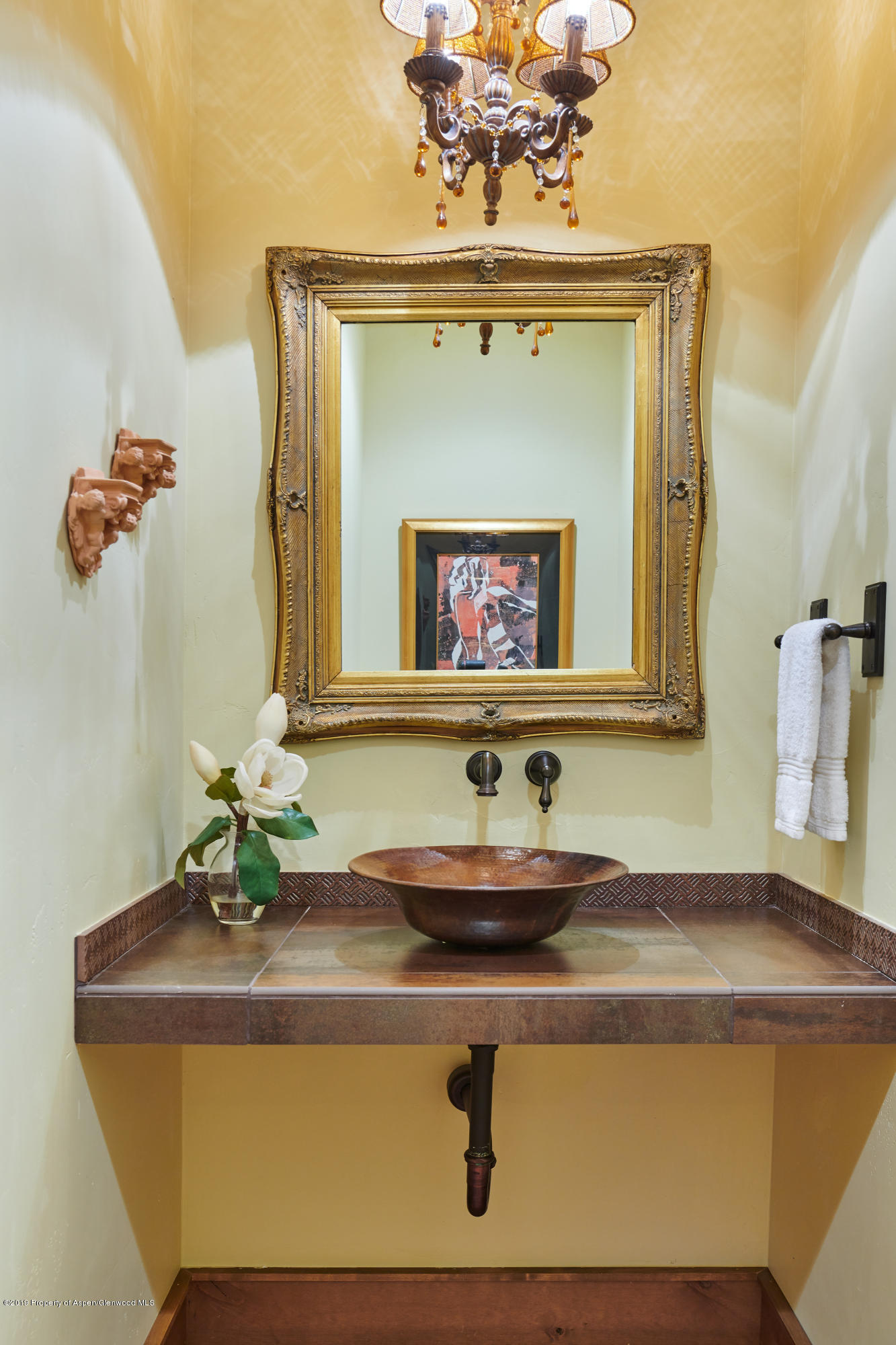 642 Holland Hills Road Basalt, CO 81621 - Photo 13 of 27 a bathroom with a mirror and a sink
