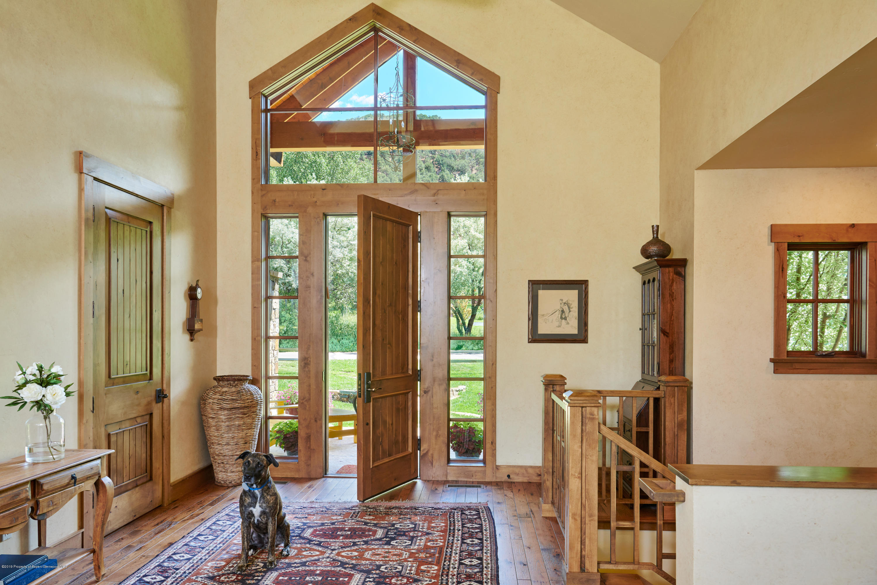 642 Holland Hills Road Basalt, CO 81621 - Photo 2 of 27 a living room with furniture and a window