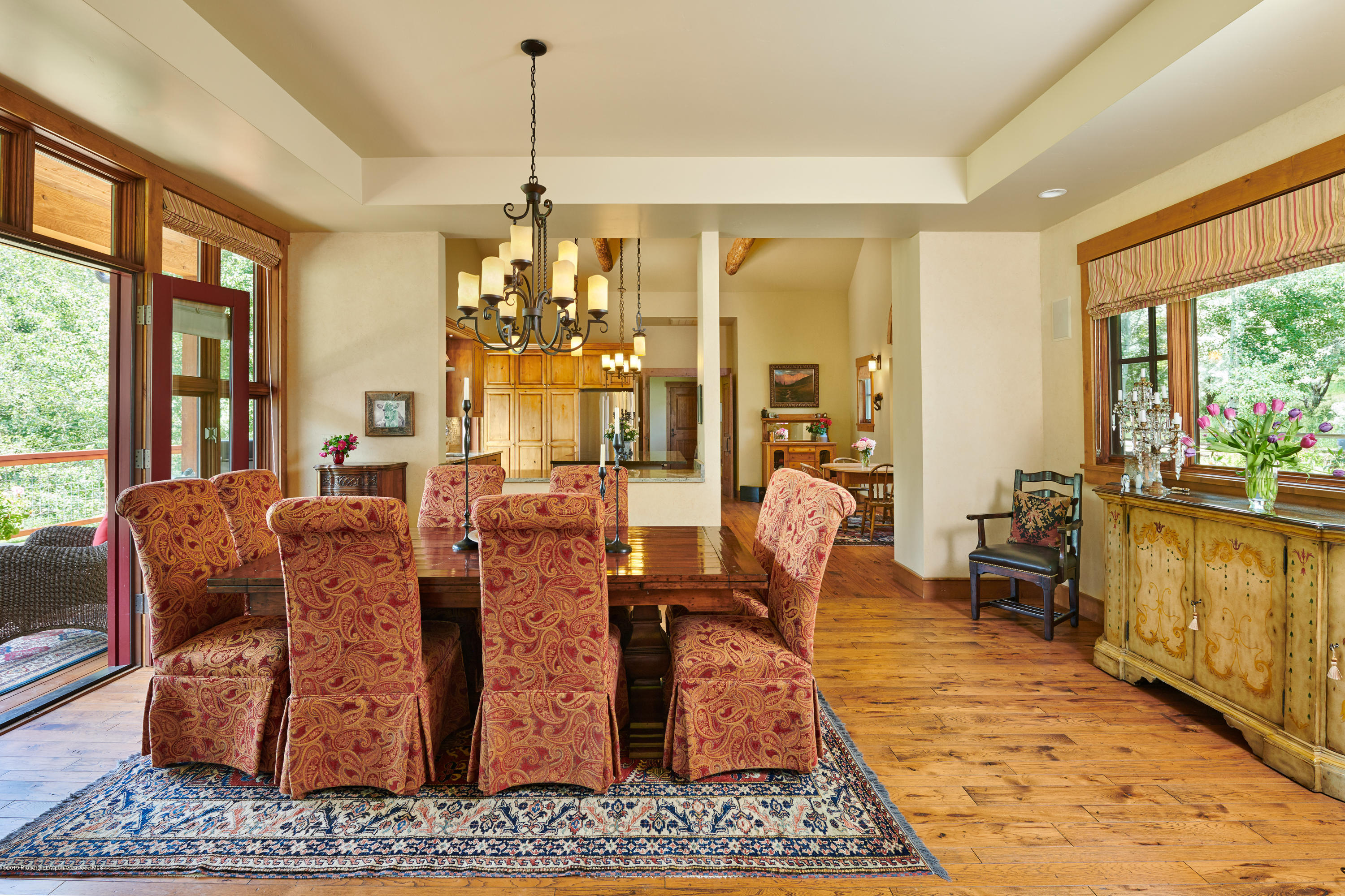 642 Holland Hills Road Basalt, CO 81621 - Photo 4 of 27 a living room with furniture large window and wooden floor