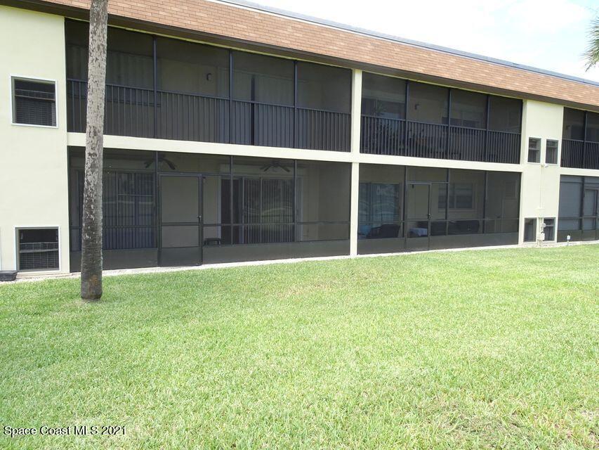 416 School Road, Unit 102 Indian Harbour Beach, FL 32937 - Photo 18 of 27 a view of a backyard