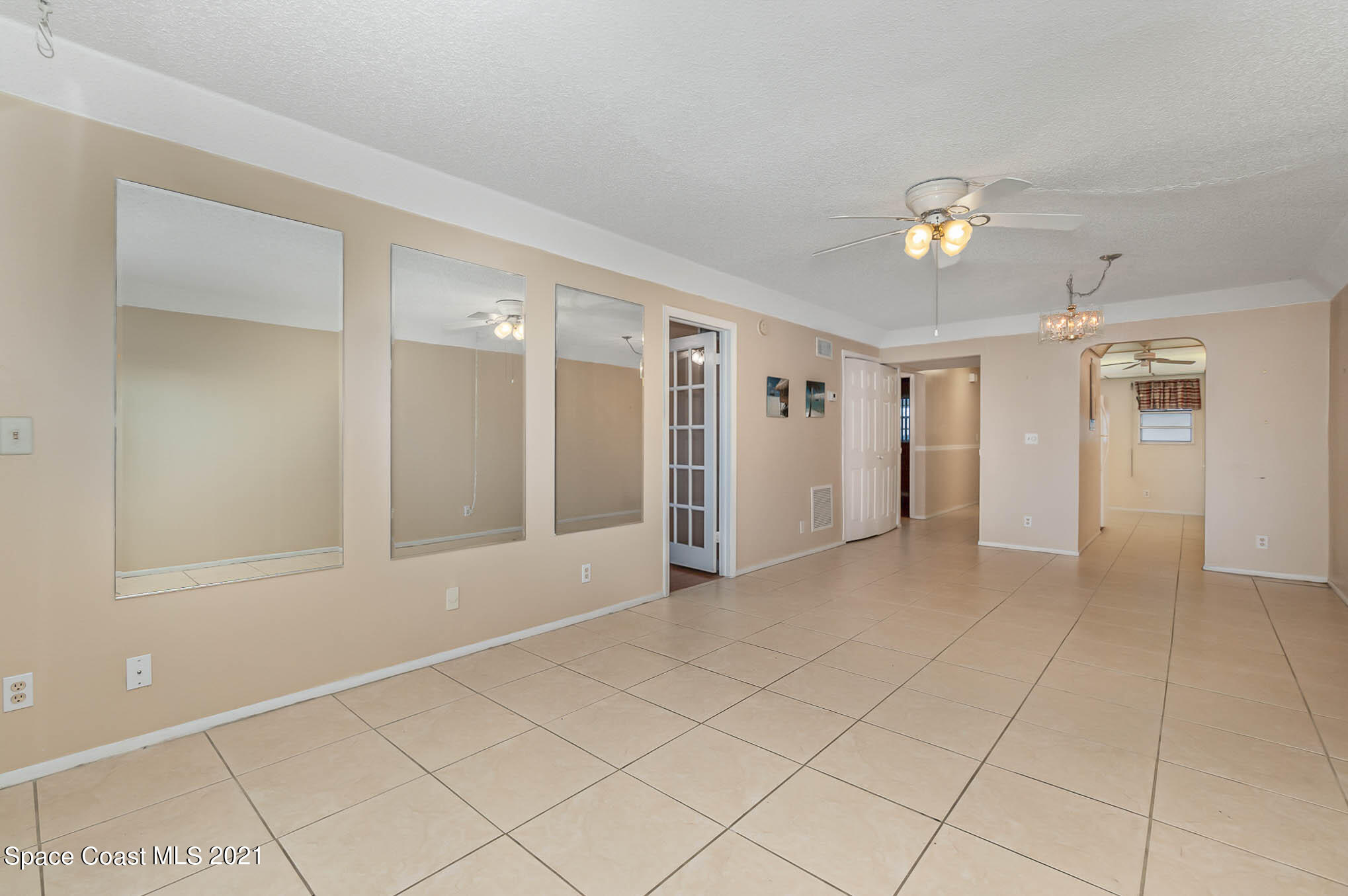 416 School Road, Unit 102 Indian Harbour Beach, FL 32937 - Photo 2 of 27 a view of an empty room with a window
