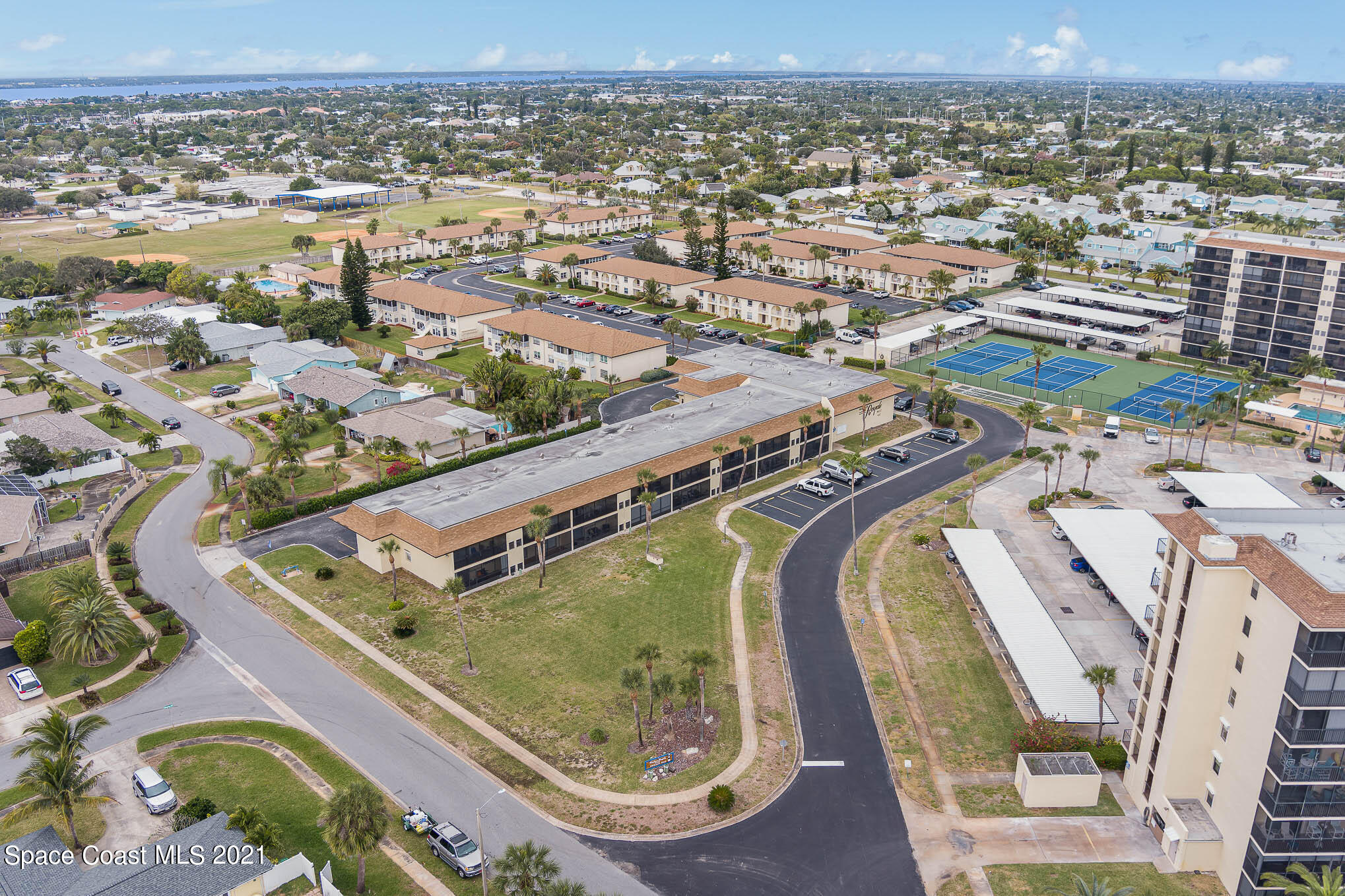 416 School Road, Unit 102 Indian Harbour Beach, FL 32937 - Photo 20 of 27 an aerial view of a residential houses with outdoor space and river