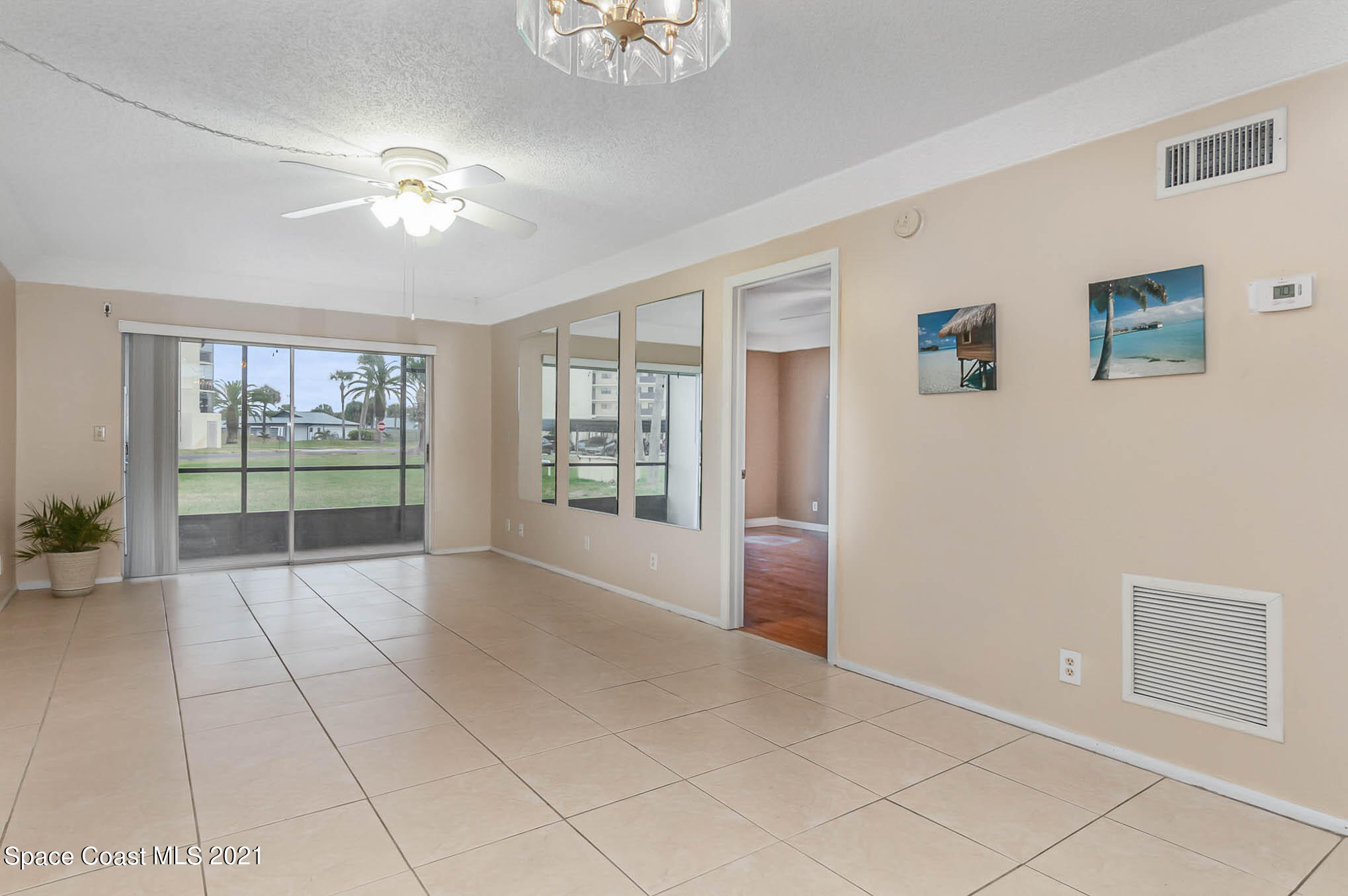 416 School Road, Unit 102 Indian Harbour Beach, FL 32937 - Photo 27 of 27 a view of an empty room with a window