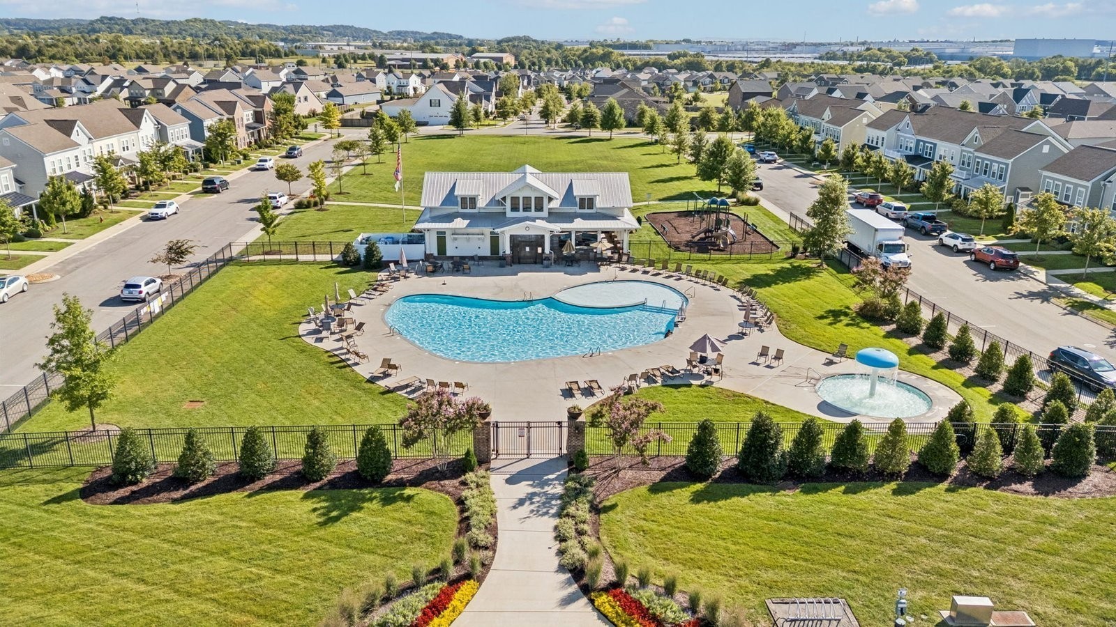 424 Wild Iris Way Spring Hill, TN 37174 - Photo 13 of 17 an aerial view of a pool patio swimming pool and ocean view