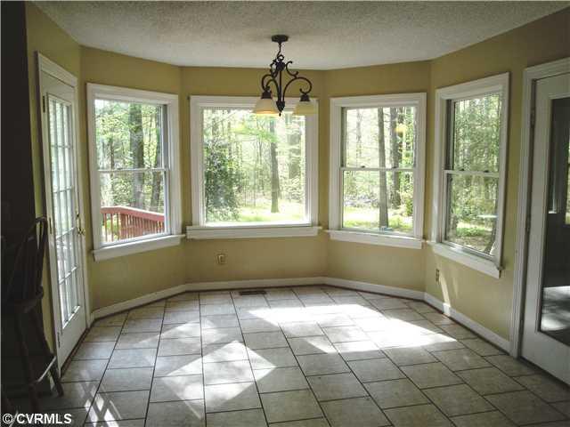 6017 Country Walk Road Midlothian, VA 23112 - Photo 3 of 12 Kitchen - This light and airy eat in kitchen overlooks 1 acre of wooded beauty - what a great way to start your morning!