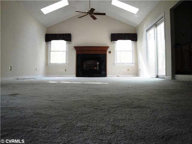 6017 Country Walk Road Midlothian, VA 23112 - Photo 4 of 12 Den/Family/Great Room - this huge great room/family room has sliding doors onto the patio, a gas fireplace and skylights - oh, did I mention the French doors leading to the dining room?