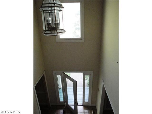 6017 Country Walk Road Midlothian, VA 23112 - Photo 5 of 12 Foyer - This breathtaking foyer has a cathedral ceiling, windos and opens onto the formal dining and living room areas!
