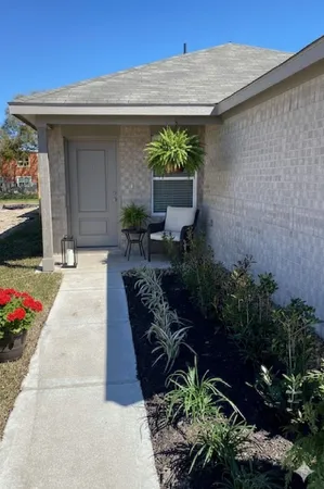 a garden view with a seating space