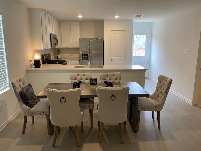 11903 Bat Sheva Lane Houston, TX 77048 - Photo 6 of 21 a view of a dining room with furniture