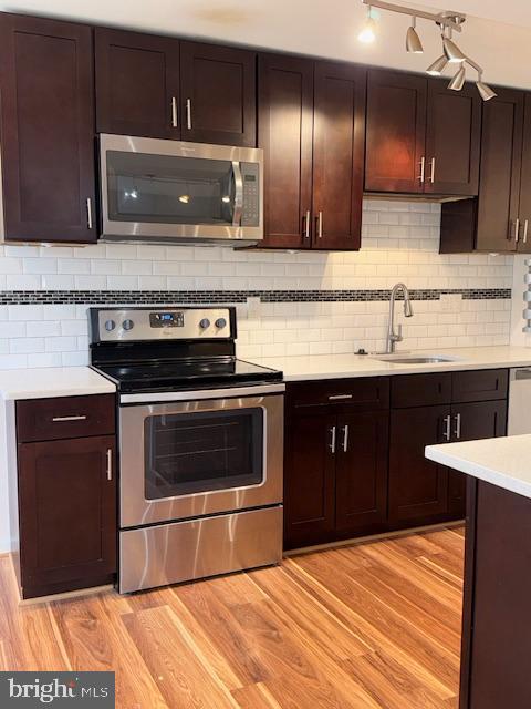 a kitchen with a stove and a sink