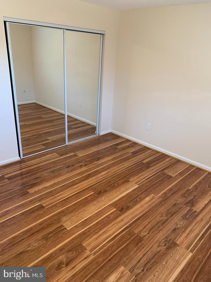 2 Normandy Square Court, Unit D Silver Spring, MD 20906 - Photo 15 of 32 a view of a room with wooden floor