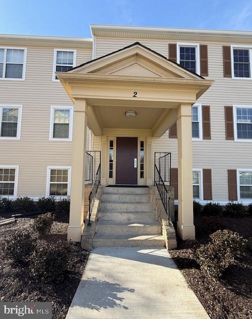 2 Normandy Square Court, Unit D Silver Spring, MD 20906 - Photo 25 of 32 a front view of a house
