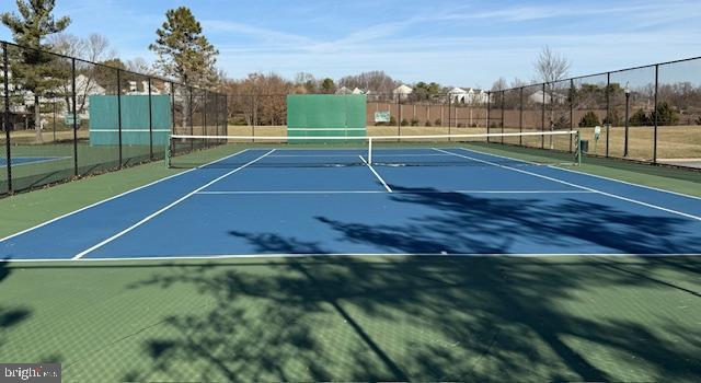 2 Normandy Square Court, Unit D Silver Spring, MD 20906 - Photo 31 of 32 a view of an outdoor space and tennis court