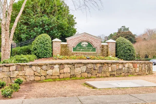 a street sign that is on the side of a building