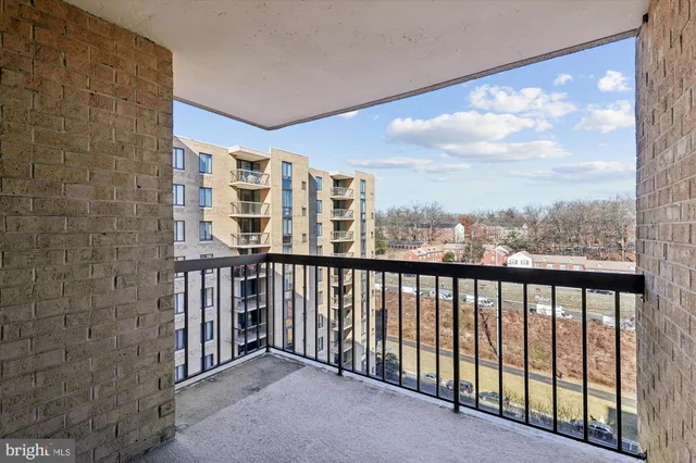 a sign that is in front of flowers